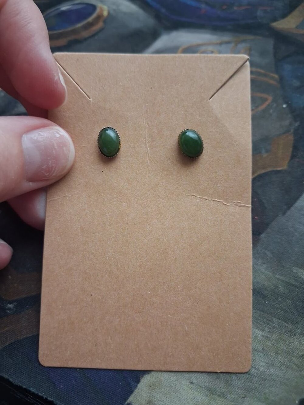 Green stoned stud earrings
